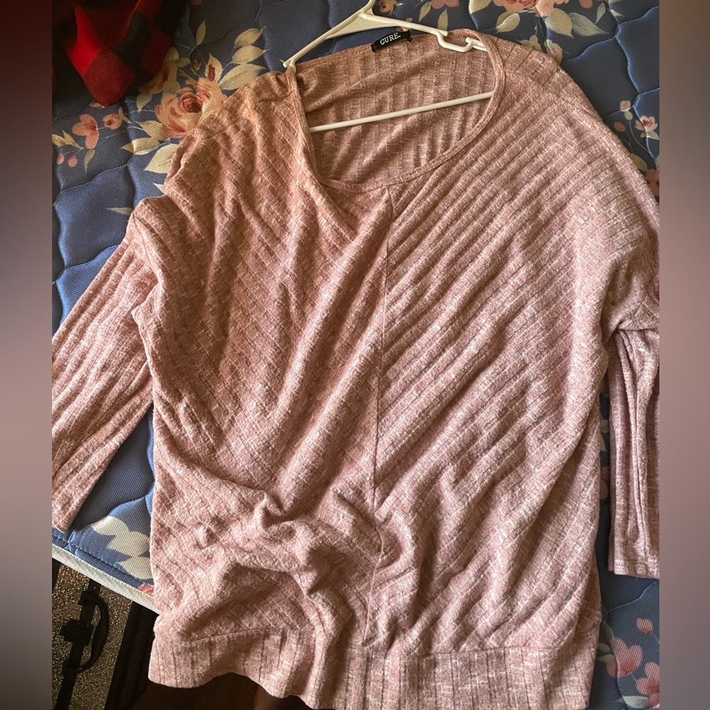Selling this light pink soft sweater like top. It’s a 2xl and fits very nice.